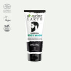 A tube of AMAzing Earth Organic Charcoal Body Wash with the brand's logo, a image of a person with a beard, and various certifications like Cosmos Organic and Vegan.