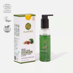 A bottle of Plantas Organic Hair Oil with a pump dispenser, next to its packaging box which has 'Cosmos Organic' and '100% Organic' seals, indicating the product is organic.