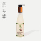 A bottle of Plantas Organic Shampoo with a pump dispenser, featuring organic and vegan certification logos.