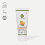 A tube of Plantas Organic Face Wash with skin brightening benefits listed on the packaging, alongside logos indicating organic and vegan certification.