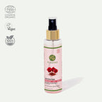 A bottle of Plantas Organic Face Toner with a spray nozzle, enriched with natural Rose and Saffron, indicating it is cruelty-free, vegan, and holds a Cosmos Organic certification.